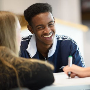 Two students having a conversation.