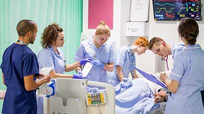 Nursing students monitoring a patient in the Simulation Suites 
