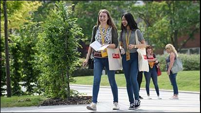 Students walking around campus on an Open Day.