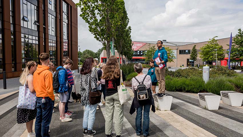 Student ambassador taking Open Day visitors on a tour of Frenchay Campus