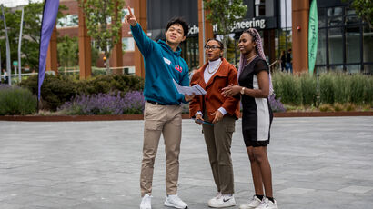 A UWE representative shows prospective students around.