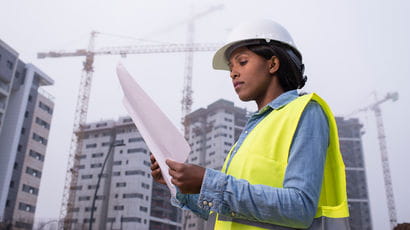 Architect or construction worker working at the construction site. 