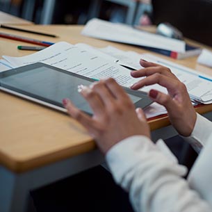 A close up of someone using a digital tablet