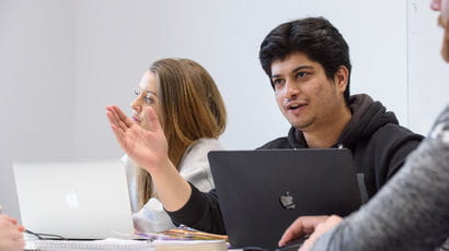 Postgraduate students in a classroom