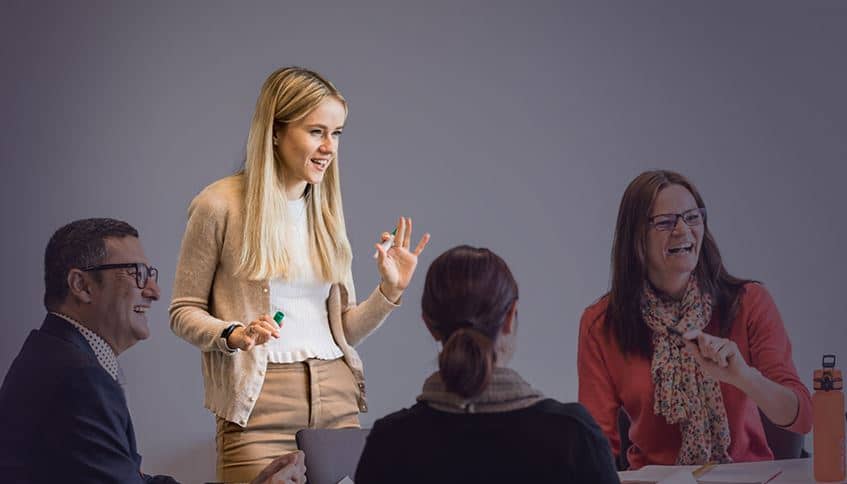 A group of professionals taking part in an interactive session.