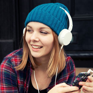 A young student watching a webinar