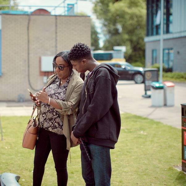 Prospective student with their parent at an open day