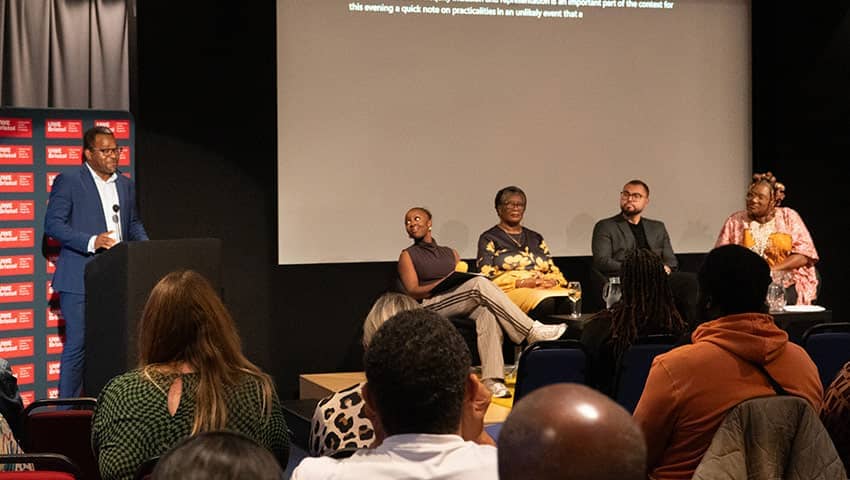 Professor Emmanuel Adukwu introducing the panellists at the Honouring our communities BDAS event.