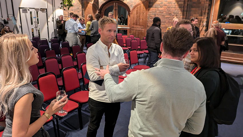 Attendees networking at the From Grount to Orbit event.