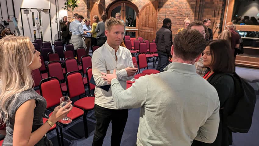 Attendees networking at the From Grount to Orbit event.