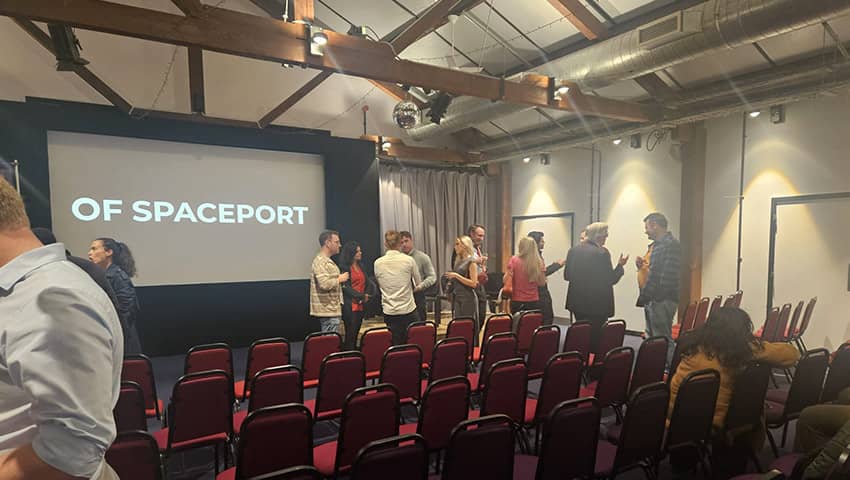 Attendees networking at the From Grount to Orbit event.