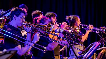 young people playing brass instruments