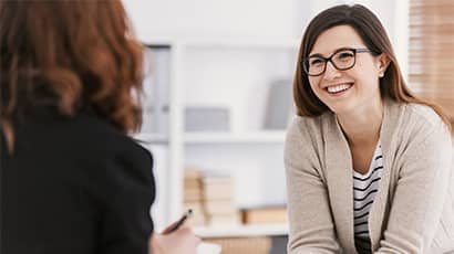 Counsellor talking to a client in a one on one session.