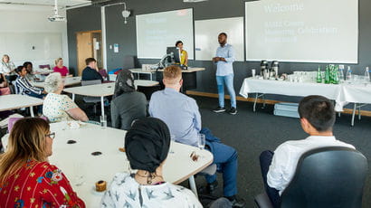 Group of people attending an event.