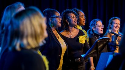 Gospel choir performing on stage.
