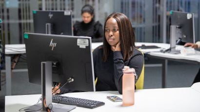 Student working at a desktop computer