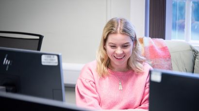 Student working on a desktop computer