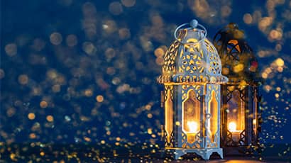 Two ornate Eid lanterns.