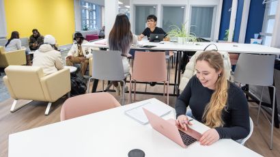 Student working in Glenside study lounge using a laptop