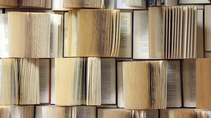Photograph of open books.