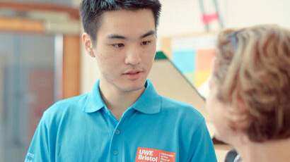 A student ambassador talking to a person