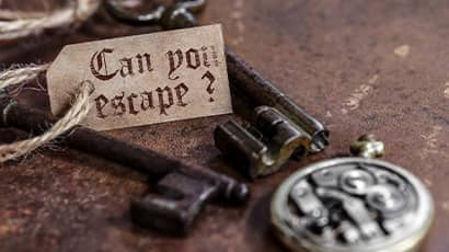 Old styled keys with a tag saying 'Can you escape?'