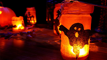 Spooky Halloween lantern glowing in the dark.