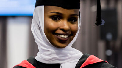 Student in graduation gown and cap