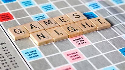 Wooden letters forming a 'games night' phrase