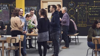 Students networking and talking to each other. 