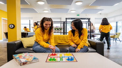Students playing board games and having a good time
