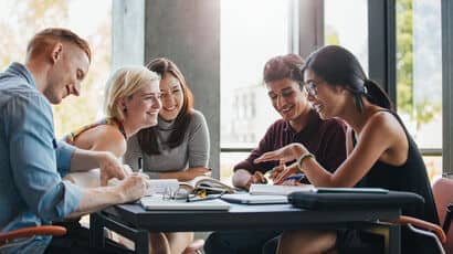 Students working together around a table