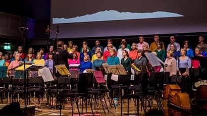 Large group of singers on stage
