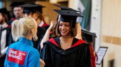 Graduate talking to a student ambassador inside the Bristol Beacon.