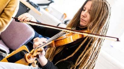 Student playing the violin