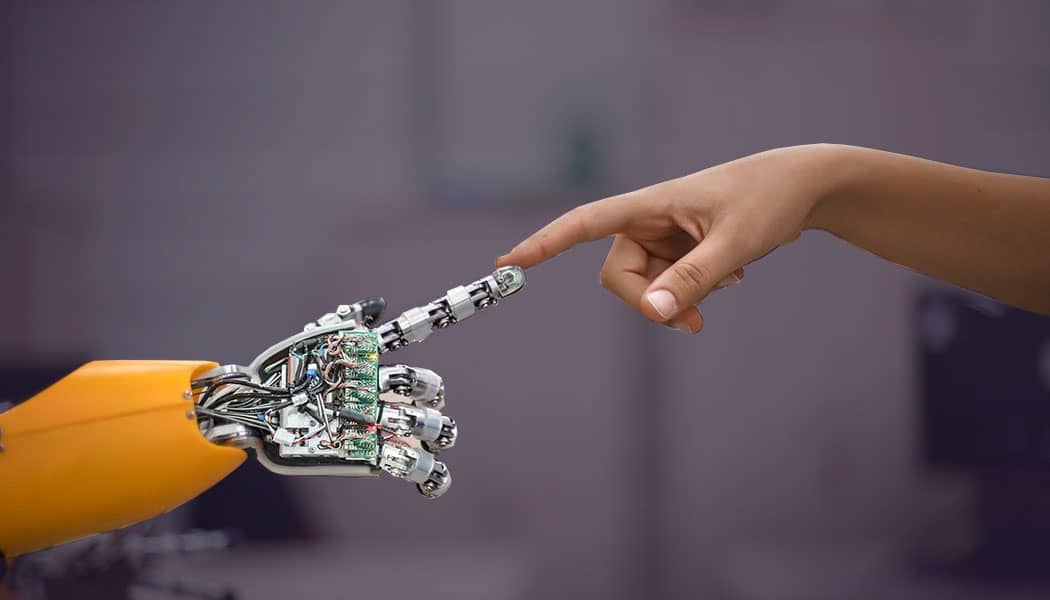 Robot and human index fingers touching