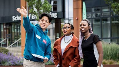 Student Ambassador giving help at Open Day