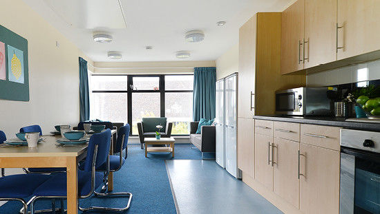 Communal kitchen seating at Newport Student Village accommodation