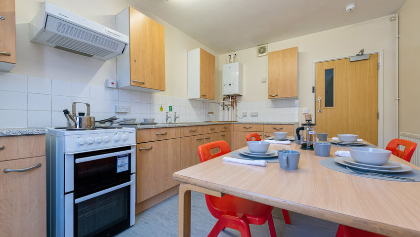 Communal kitchen at Upper Quay House accommodation