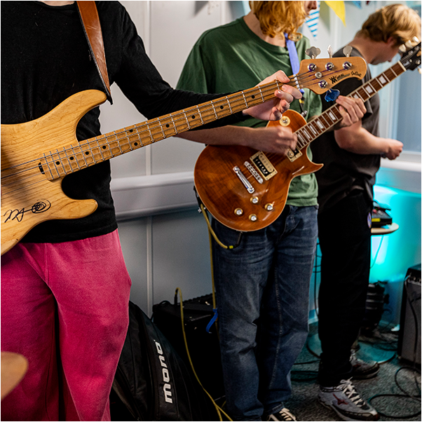 students playing guitar and bass