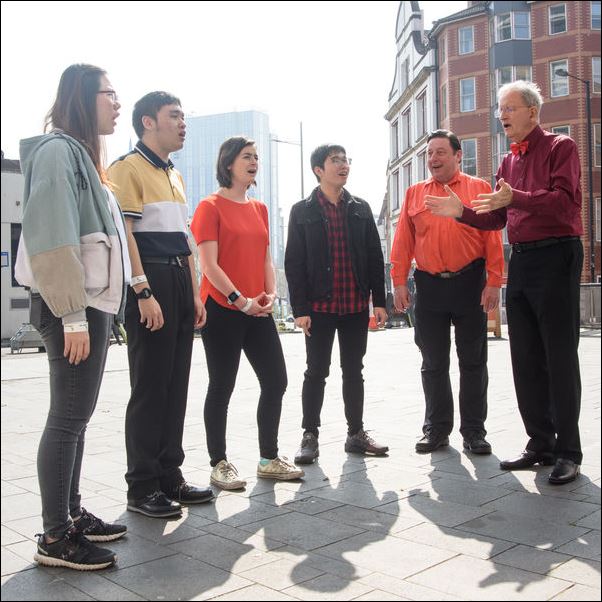 Barbershop group singing acapella outside the Colston Hall