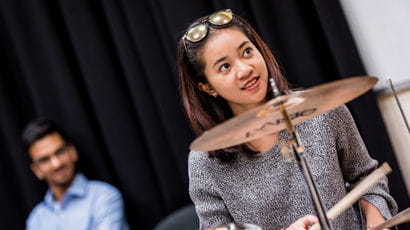 Drummer in rehearsal space 