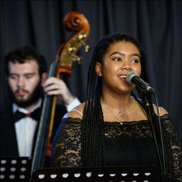 Female singer performing in a concert