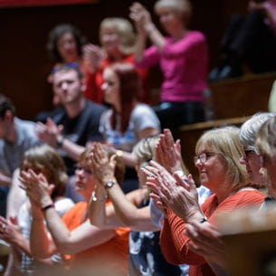 People clapping after a performance