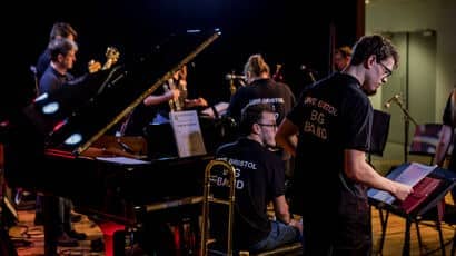 UWE Orchestra performing on stage.