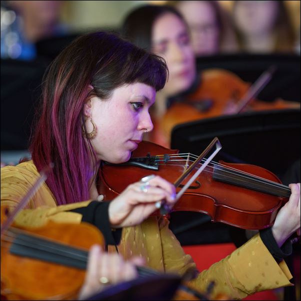 String player in an Orchestra