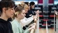 Students at BarreX, a ballet-based fitness class.