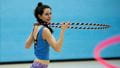 Female student takes part in Hula Hooping trick class at the Centre for Sport. 
