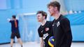Two male students join a volleyball session at the Centre for Sport.