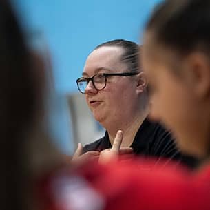 Profile shot of Women's Volleyball Coach Janna Rogers.